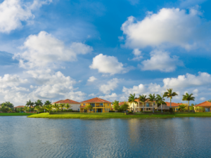 Scenic view of Miami Lake, FL with vibrant foliage and tranquil waters.